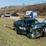 Chevrolet Silverado with heavy front-end damage
